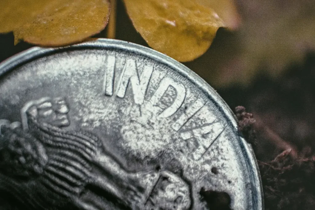 Indian Rupee Record Low Below 90 Per Dollar for the First Time