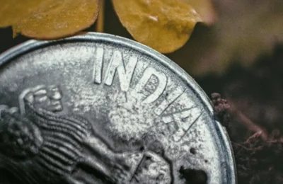 Indian Rupee Record Low Below 90 Per Dollar for the First Time