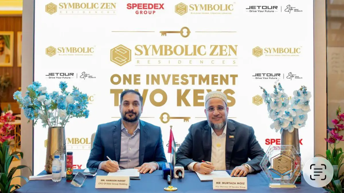 2 - Times of Dubai Elite group cfo haroon hayat and speedex group vice chairman mustafa moiz signing the agreement