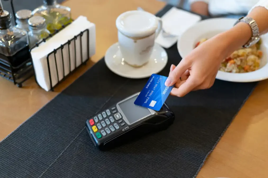 image 16 - Times of Dubai Visa and Emirates NBD agreement for local dirham settlement of UAE card payments.