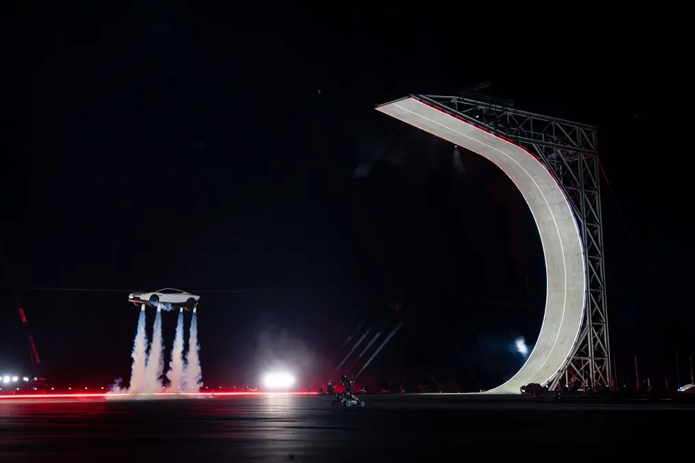 Roadster Tesla - Times of Dubai A tesla roadster shown mid air during a stunt highlighting the proposed capabilities of its spacex thruster package Times of dubai