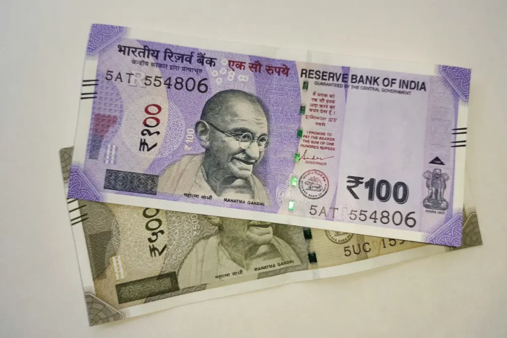 Indian Rupee Record Low Below 90 Per Dollar for the First Time