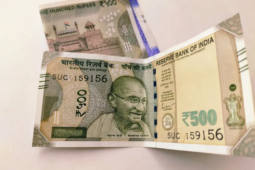 Indian Rupee Record Low Below 90 Per Dollar for the First Time