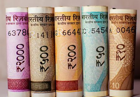 Indian Rupee Drops on 50% US Tariffs, Nears 24 Against Dirham