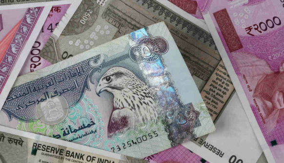 Indian Rupee Drops on 50% US Tariffs, Nears 24 Against Dirham