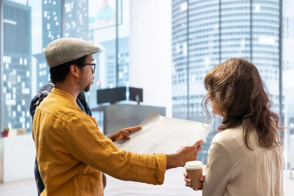 business-professionals-broker-evaluating-property-corporate-relocation_482257-90901 - Times of Dubai Dubai ejari rent contract now demands detailed upgrade disclosures times of dubai