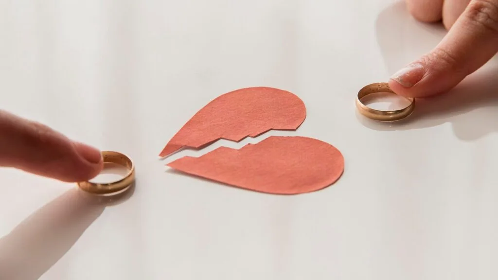 high-angle-hands-touching-wedding-rings_23-2148542313 - Times of Dubai Divorce doulas in dubai offer guidance for smooth and mindful separations times of dubai