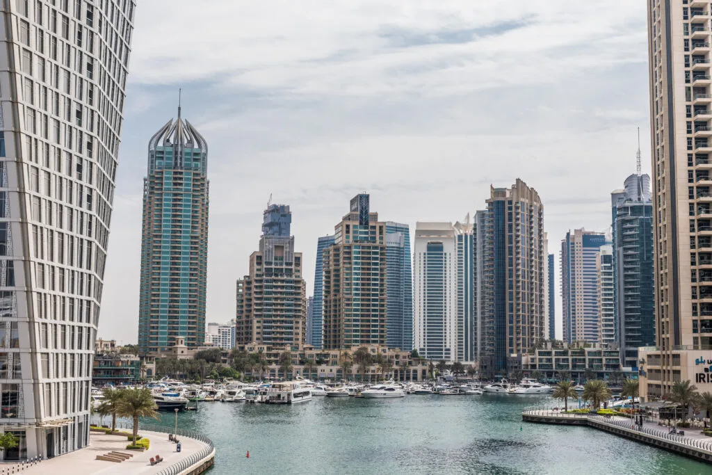 Dubai, United Arab Emirates - October, 2018: Promenade and canal in Dubai Marina with luxury skyscrapers around, United Arab Emirates - Times of Dubai Dubai property indian buyers warned against using international credit cards times of dubai