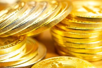 Free gold coins on offer as uae jewellers cut margins amid record prices times of dubai